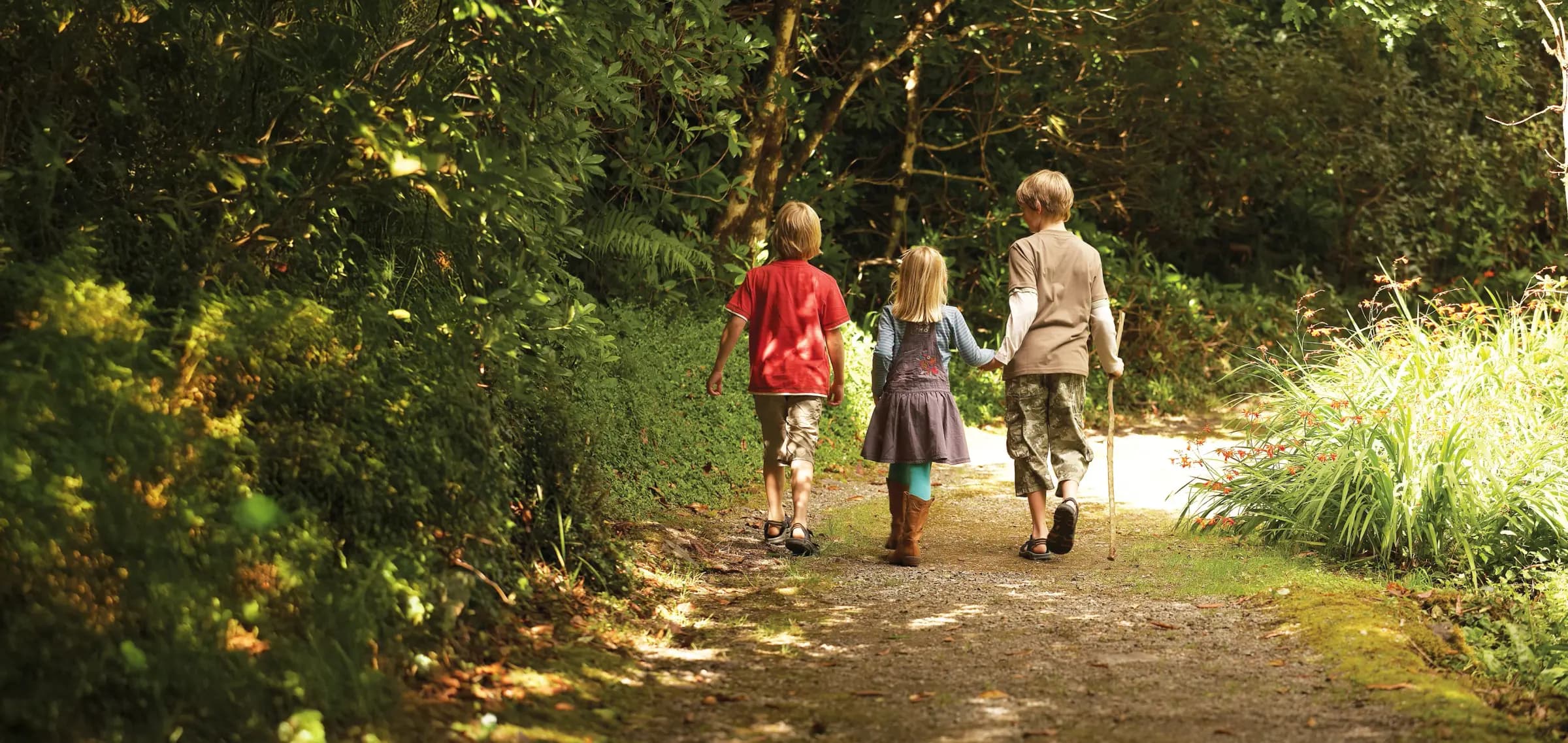 Children walking together outdoors